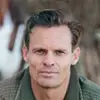 man wearing green jacket avatar